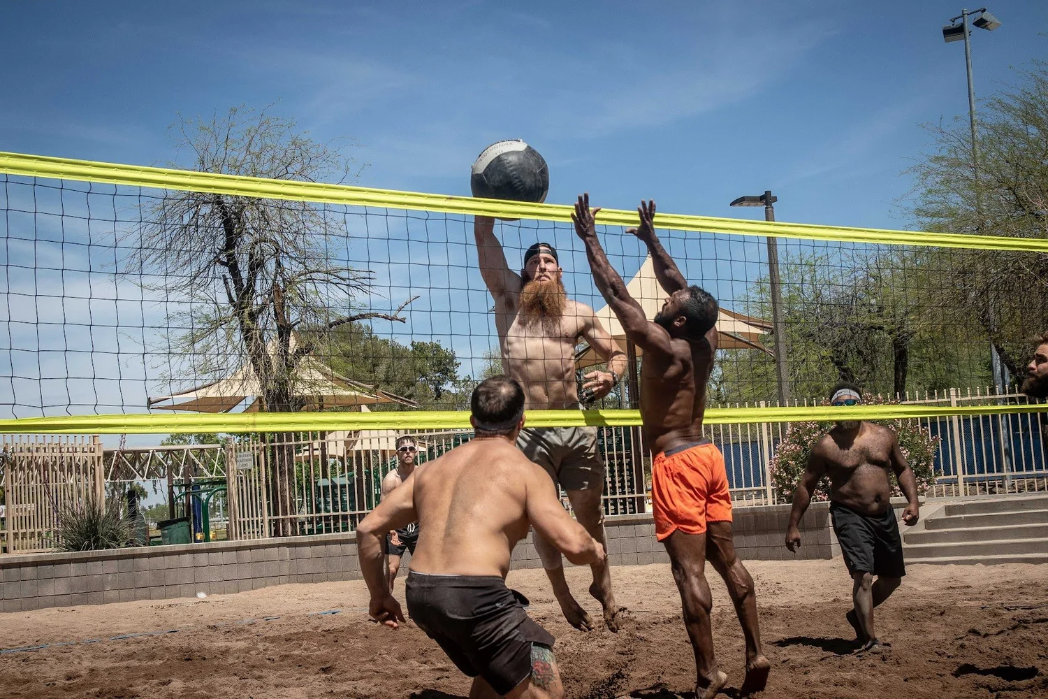 Hoov Nation athletes contesting a ball at the net